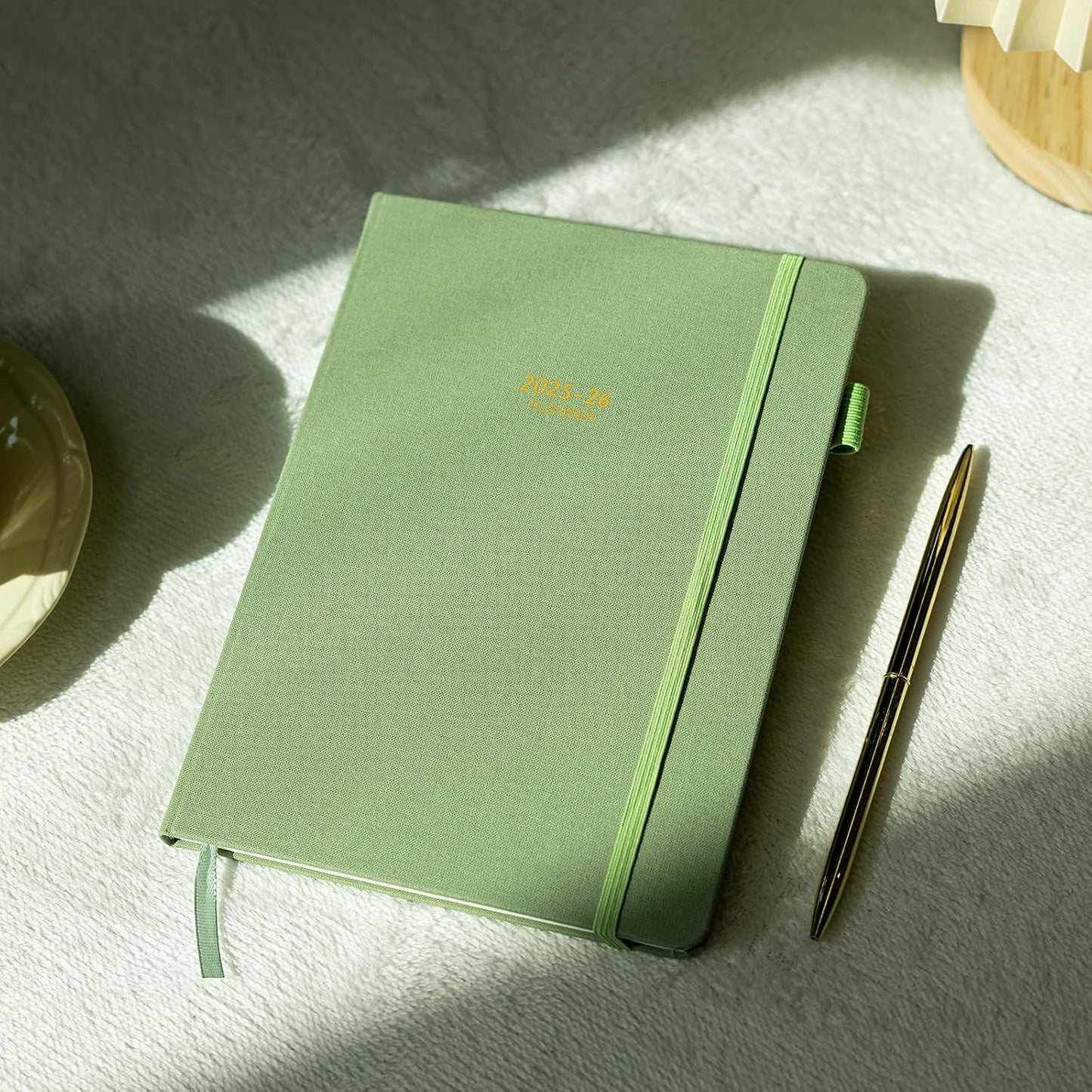 Getink 2025-2026 Linen cover Planner Weekly & Monthly Daily Agenda Book,2025-2026 To Do List Notebook with Colorful Monthly Tabs, Inner Pocket, Elastic Closure (Green,5.5 * 8.5)