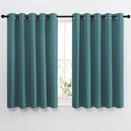 NICETOWN Blackout Curtains for Kids Room - Triple Weave Microfiber Home Thermal Insulated Solid Ring Top Blackout Panels/Drapes for Bedroom(Sea Teal, Set of 2, 66 x 54 Inch)