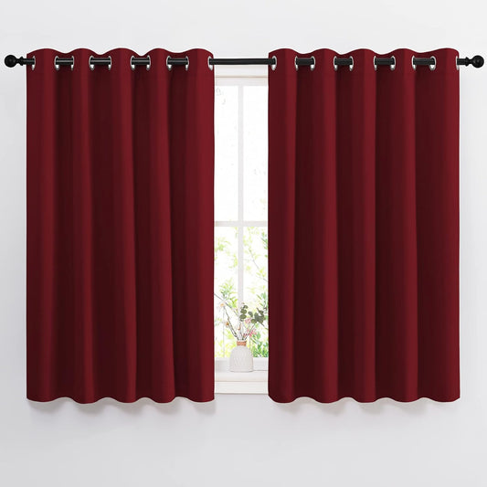 NICETOWN Blackout Draperies Curtain Panels - Thermal Insulated Solid Grommet Blackout Curtains/Panels/Drapes for Living Room(Burgundy Red, 1 Pair, 66 by 54-Inch)