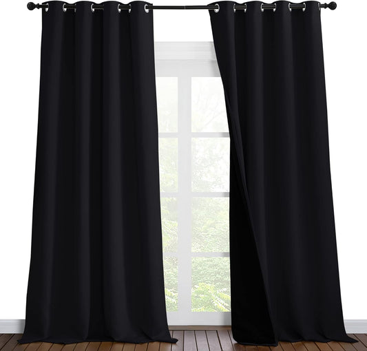 NICETOWN Cold Blocking 100% Blackout Curtains, Durable Black Lined Blackout Curtains for Bedroom, Energy Saving Long Curtains for Patio Sliding Glass Door, Black, 55 inches x 96 inches, 2 Panels