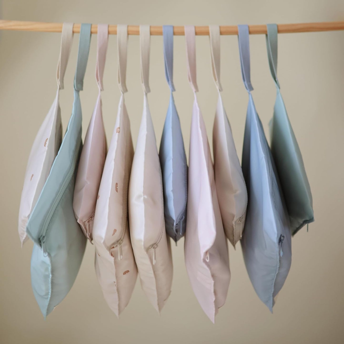 mushie Water Resistant Wet Bags | Large & Small Reusable Storage Bag for Baby Items and Travel | Zippered Pockets with Handle | Machine Washable, Set of 2 (Roman Green)