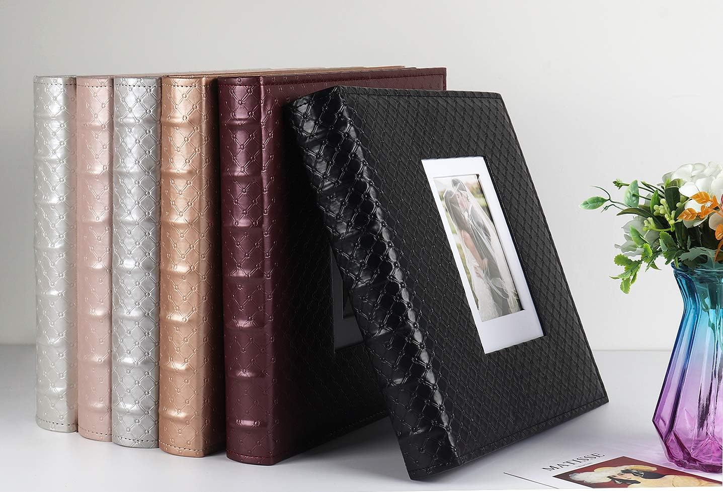 RECUTMS 4x6 Photo Album 600 Photos Large Capacity Black Inner Page Button Grain Leather Pockets Family Album Book Horizontal & Vertical Photos (Light Brown)13.6 x 13.2 x 2.2 inches