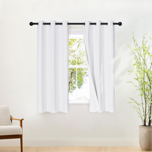 NICETOWN 100% Blackout White Curtains 63 inch Length, Grommet Thermal Insulated Window Treatment Heat Reducing Drapes for Bedroom/Kids Room, W37 x L63, 2 Panels