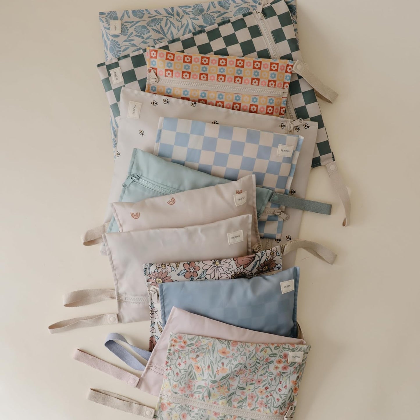 mushie Water Resistant Wet Bags | Large & Small Reusable Storage Bag for Baby Items and Travel | Zippered Pockets with Handle | Machine Washable, Set of 2 (Retro Flowers)